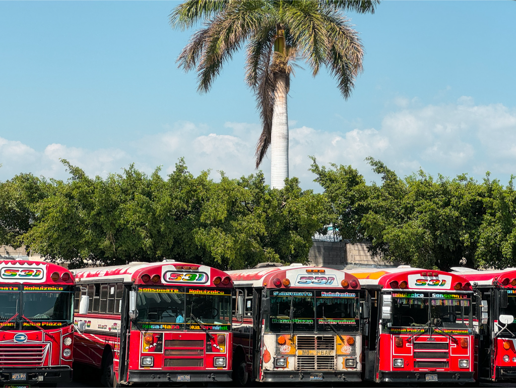 a station full of busses in el salvador