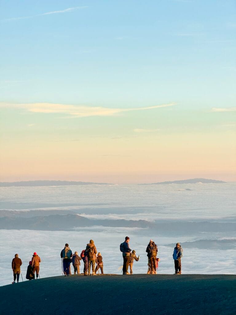 guatemala travel acatenango hikers in the clouds at sunrise