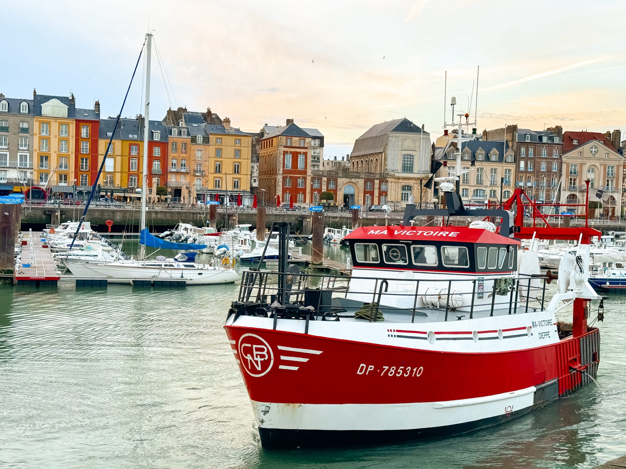 french fishing boats coming home to the harbour in dieppe france travel