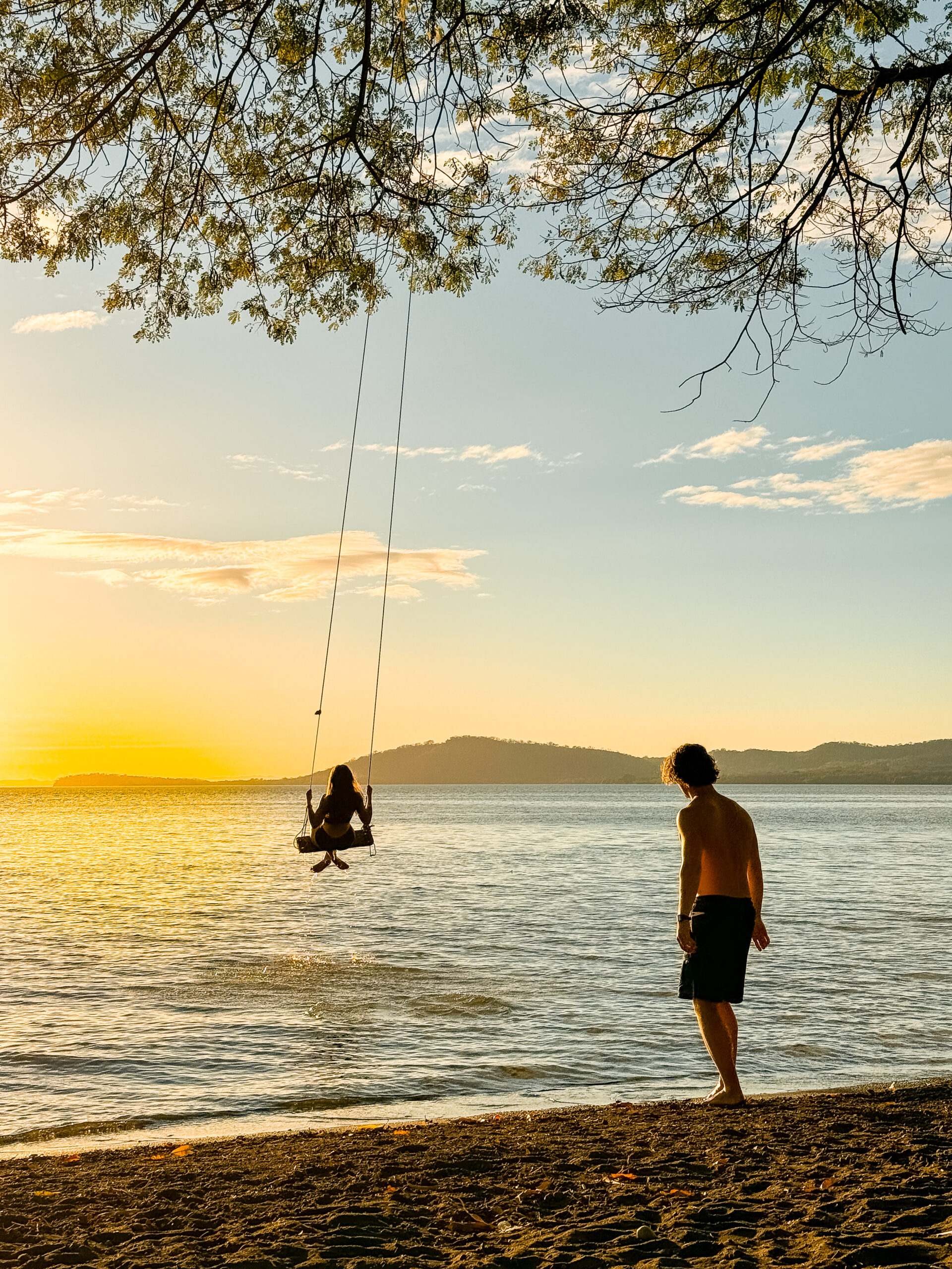 Ometepe island nicaragua travel guides sunset over the lake swing
